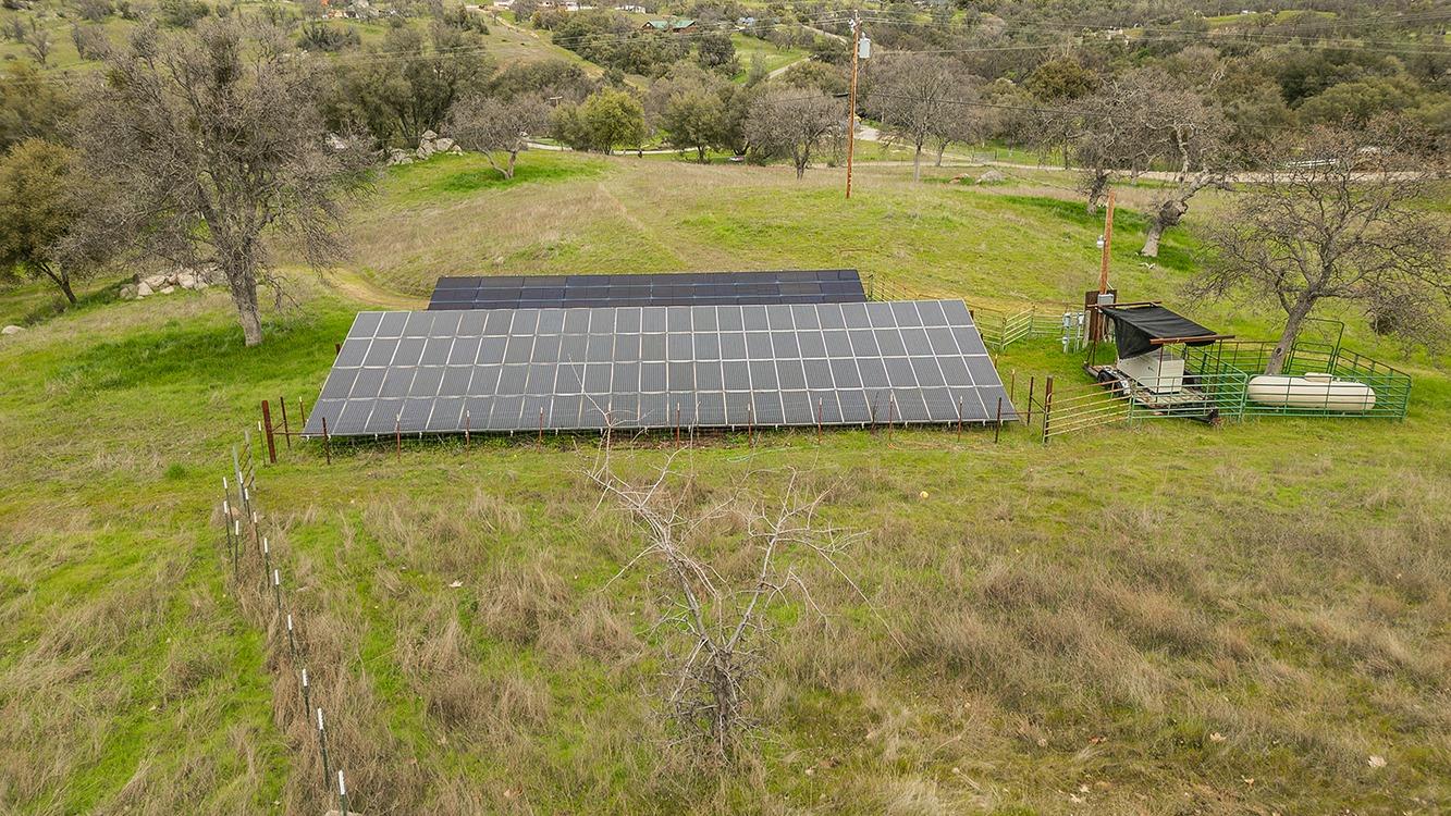 21777 Tollhouse Road Clovis, CA 93619 - Photo 84 of 99 a view of a yard with an outdoor space