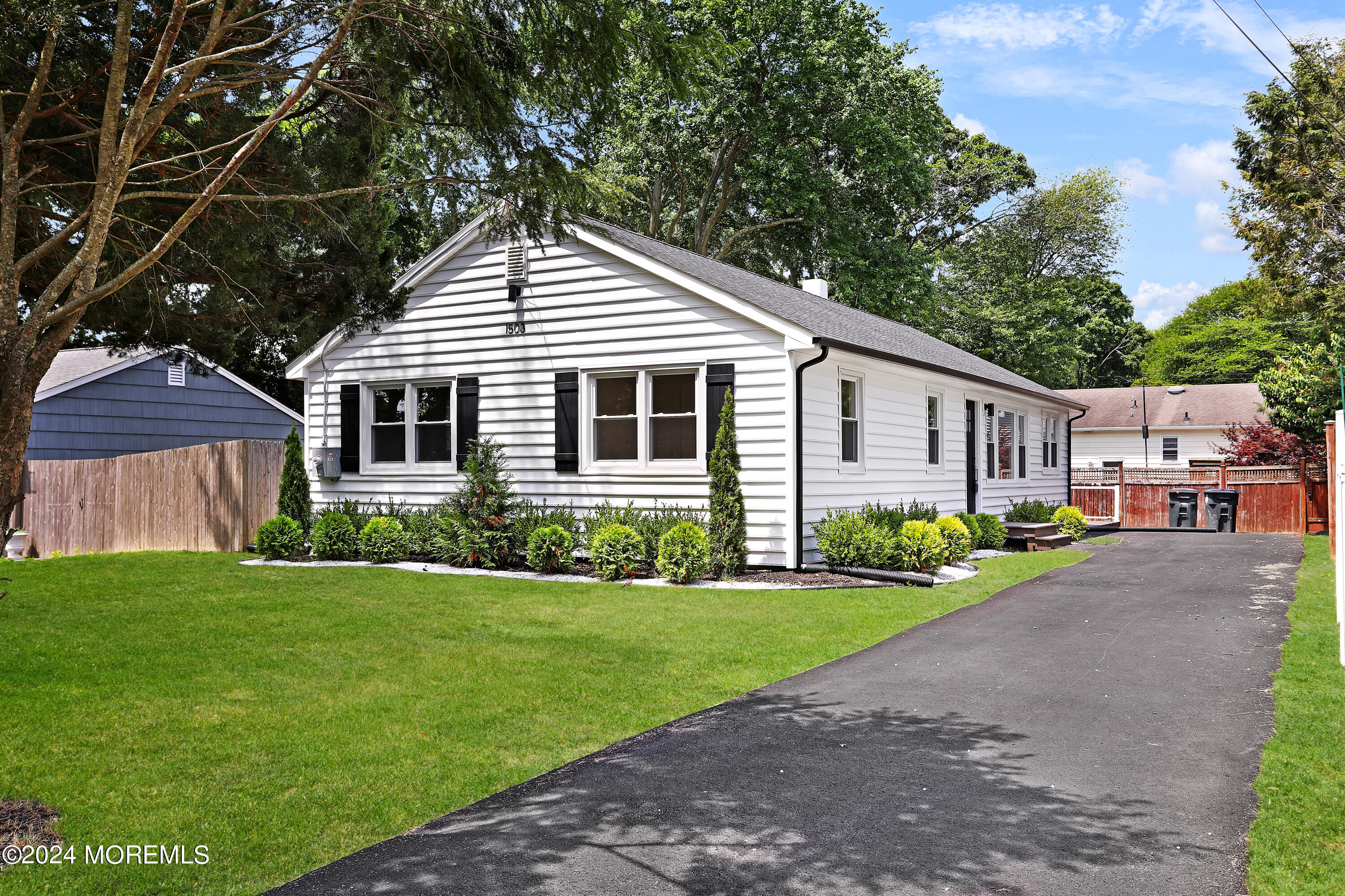 1503 Adrienne Road Wall, NJ 07719 - Photo 1 of 36 a view of a house with a yard