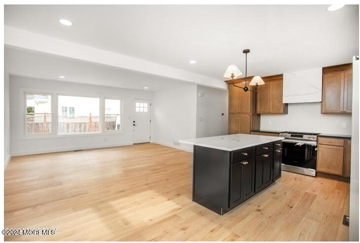 1503 Adrienne Road Wall, NJ 07719 - Photo 4 of 36 a kitchen with a stove and a sink