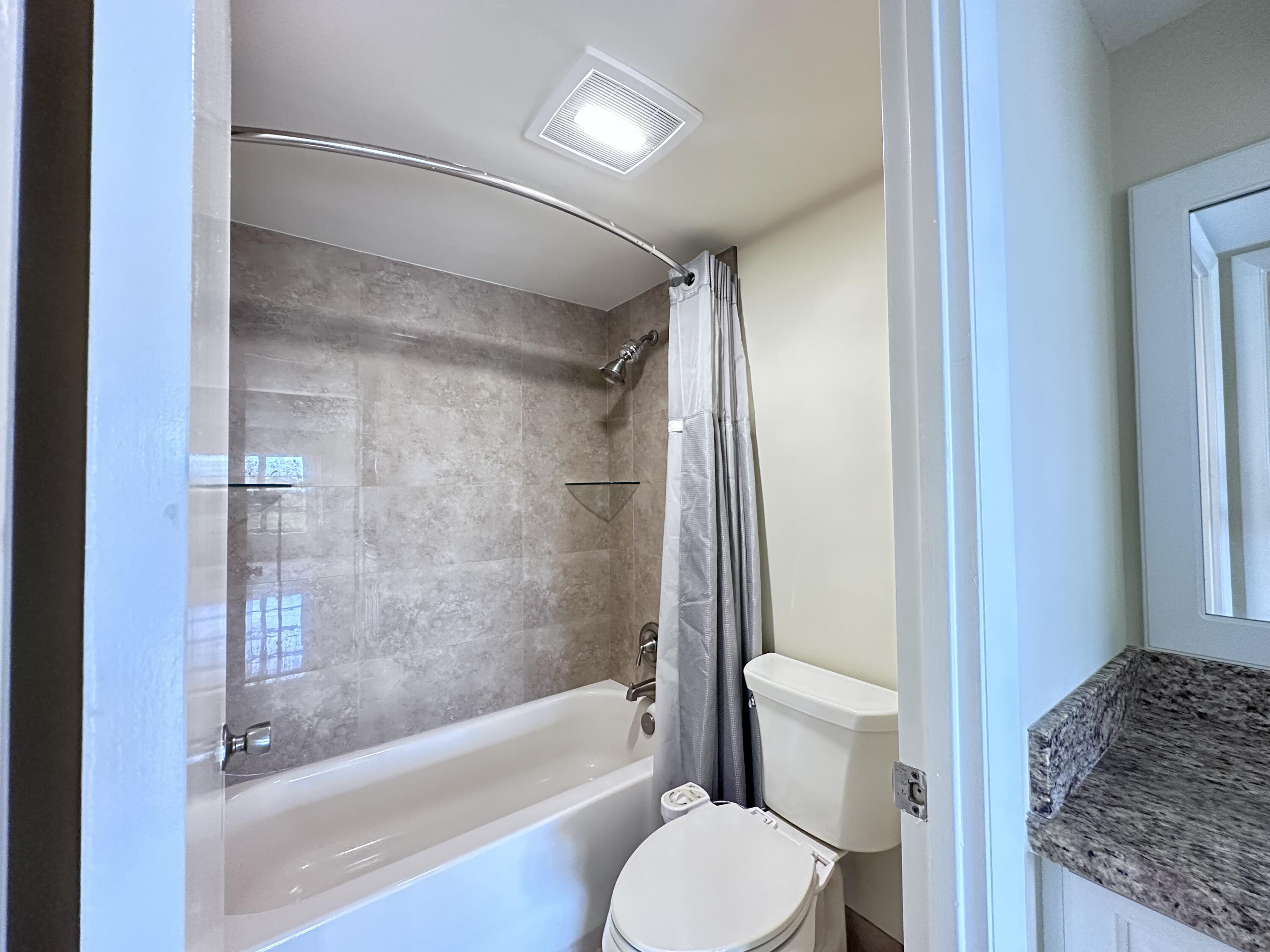 10777 West Sample Road, Unit 714 Coral Springs, FL 33065 - Photo 10 of 19 Master bathroom shower