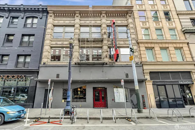 a front view of a building with glass windows