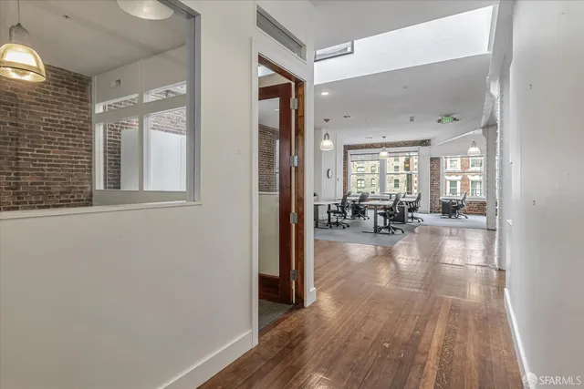 a view of workspace with wooden wall
