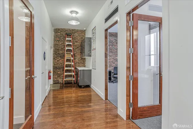 a view of a dining room with furniture and window