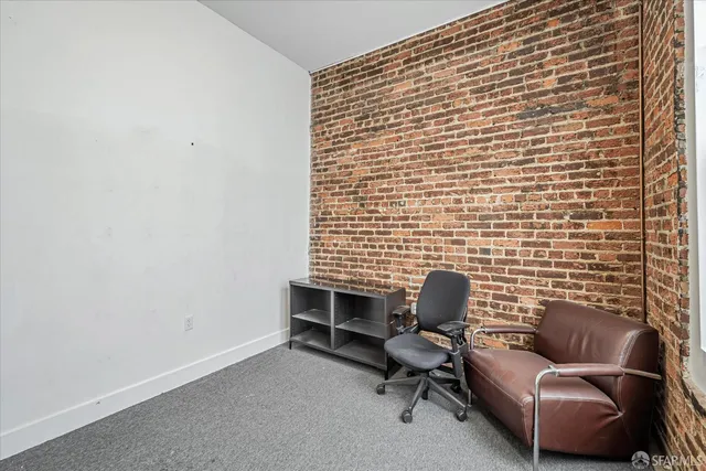 a view of livingroom with furniture and windows