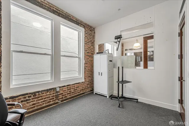 a view of a utility room with closet