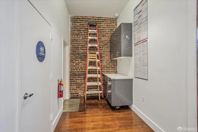 a bathroom with a toilet and a sink