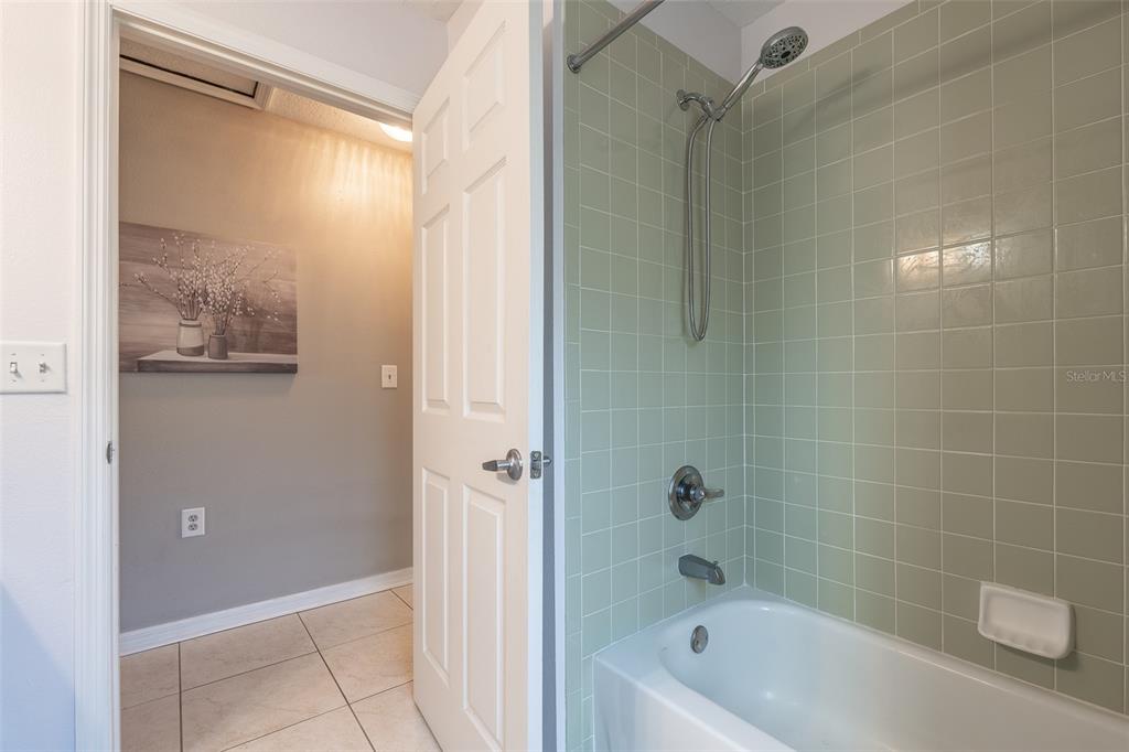 15143 Southwest 14th Avenue Road Ocala, FL 34473 - Photo 30 of 53 a bathroom with a bathtub and shower