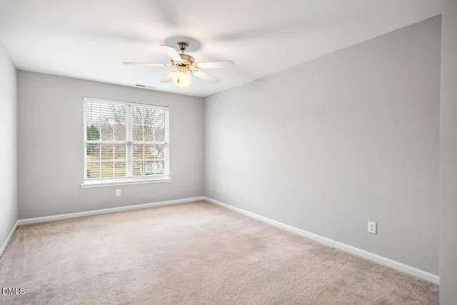 a kitchen with granite countertop cabinets stainless steel appliances and a sink