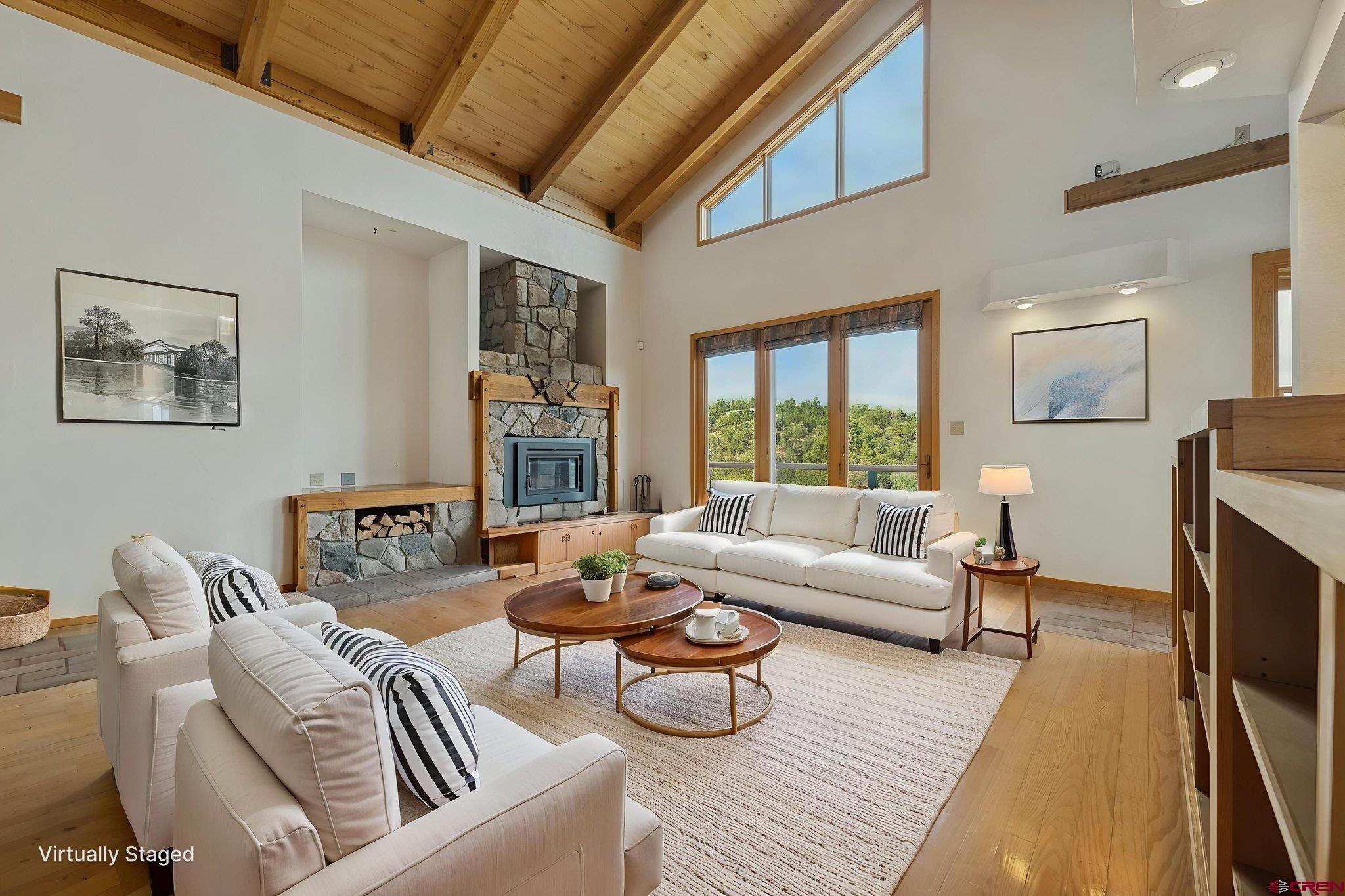 481 Far View Road Durango, CO 81303 - Photo 13 of 45 a living room with furniture and a large window