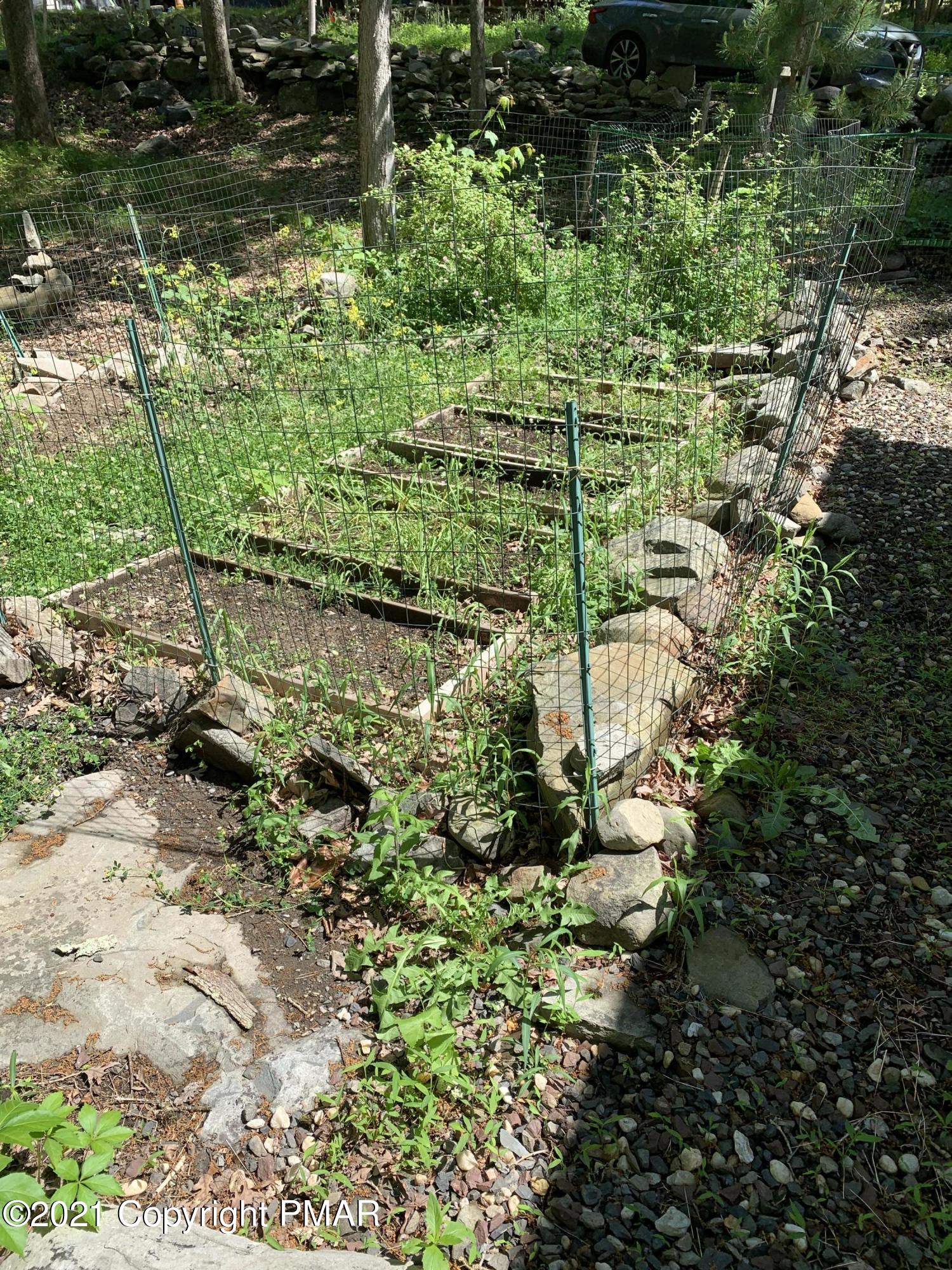 227 Canterbury Road Bushkill, PA 18324 - Photo 51 of 68 a view of a garden with plants