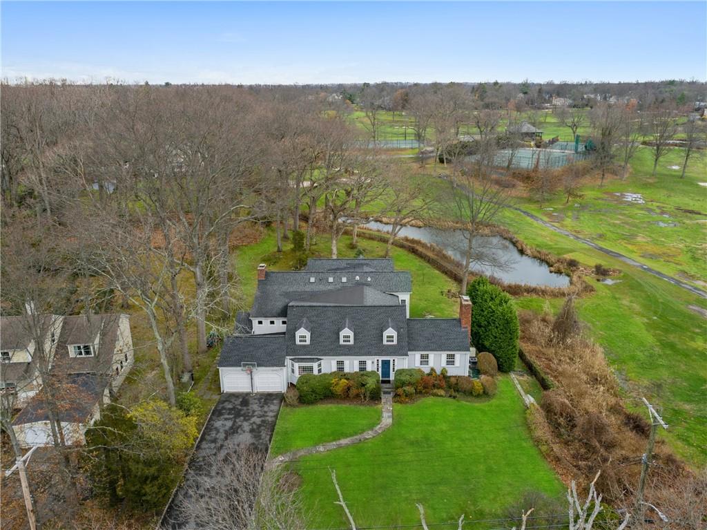 520 Hommocks Road Larchmont, NY 10538 - Photo 1 of 1 This photos shows the surprising depth to the house and golf course views which are prevalent frommany rooms in the house
