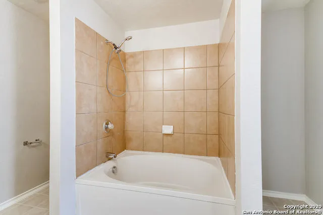 a bathroom with a bathtub