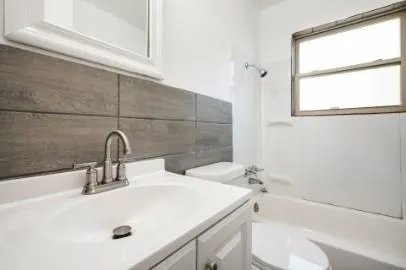 a bathroom with a sink and a bathtub