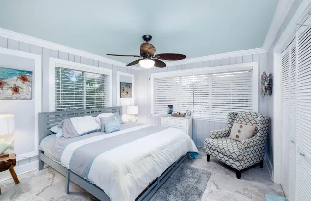 a view of a livingroom with furniture and a flat screen tv