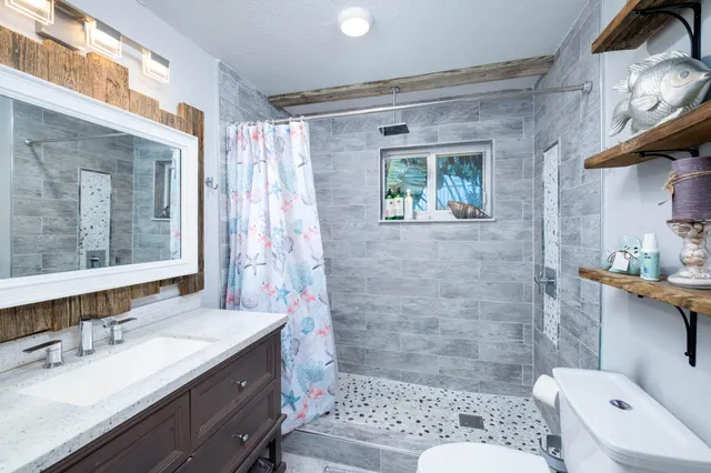 a swimming pool with outdoor seating and yard