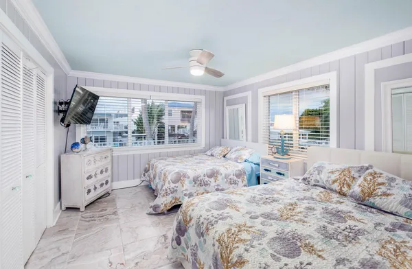 a view of balcony with outdoor seating and city view