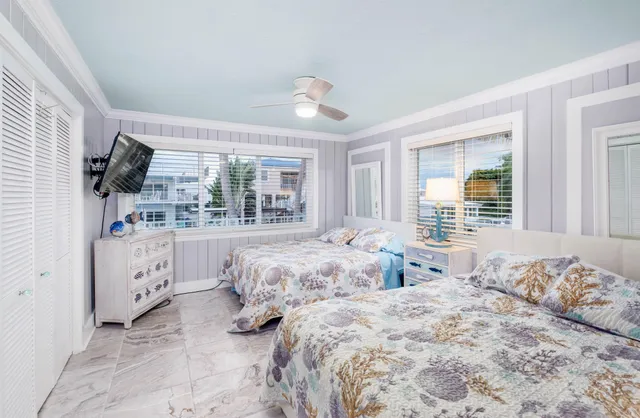 a view of swimming pool with outdoor seating and plants