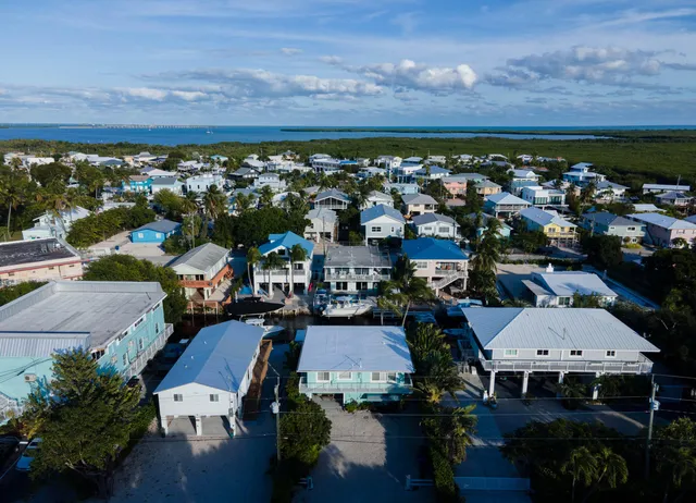 a view of balcony with outdoor seating and city view
