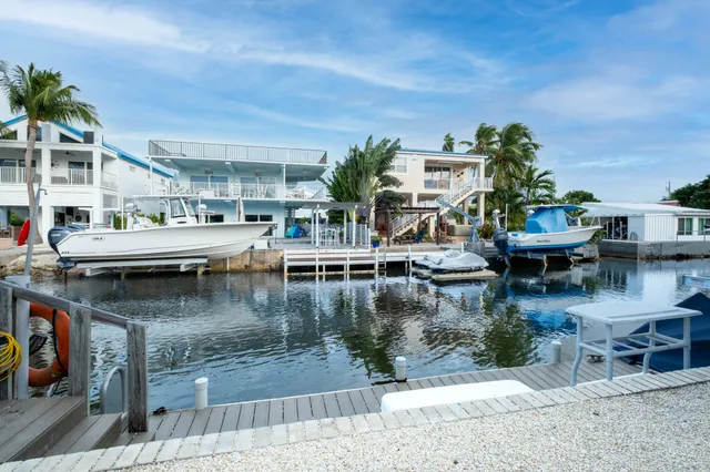 $1,225,000 | 105 Long Key Lake Drive, Layton, FL 33001