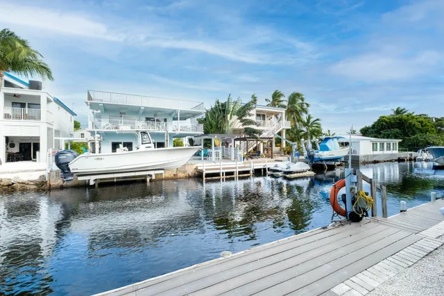 a view of outdoor along with deck and outdoor seating
