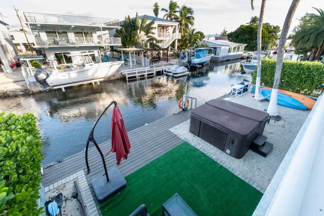 $1,225,000 | 105 Long Key Lake Drive, Layton, FL 33001