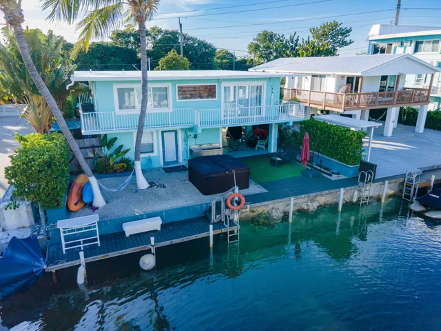 $1,225,000 | 105 Long Key Lake Drive, Layton, FL 33001