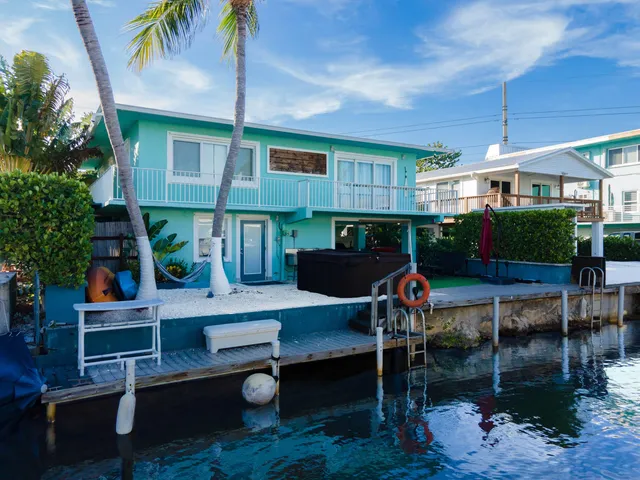 $1,225,000 | 105 Long Key Lake Drive, Layton, FL 33001