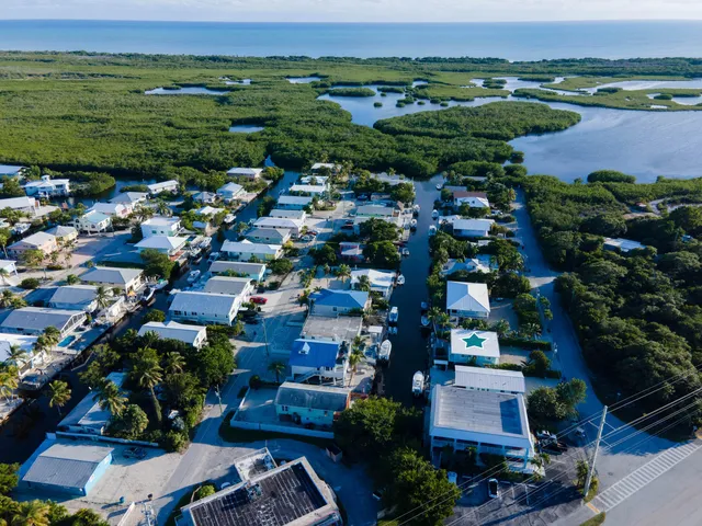 $1,225,000 | 105 Long Key Lake Drive, Layton, FL 33001