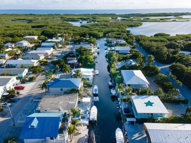 $1,225,000 | 105 Long Key Lake Drive, Layton, FL 33001