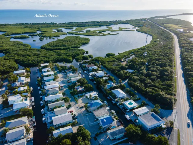 $1,225,000 | 105 Long Key Lake Drive, Layton, FL 33001