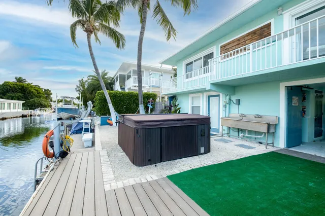 a backyard of a house with seating space