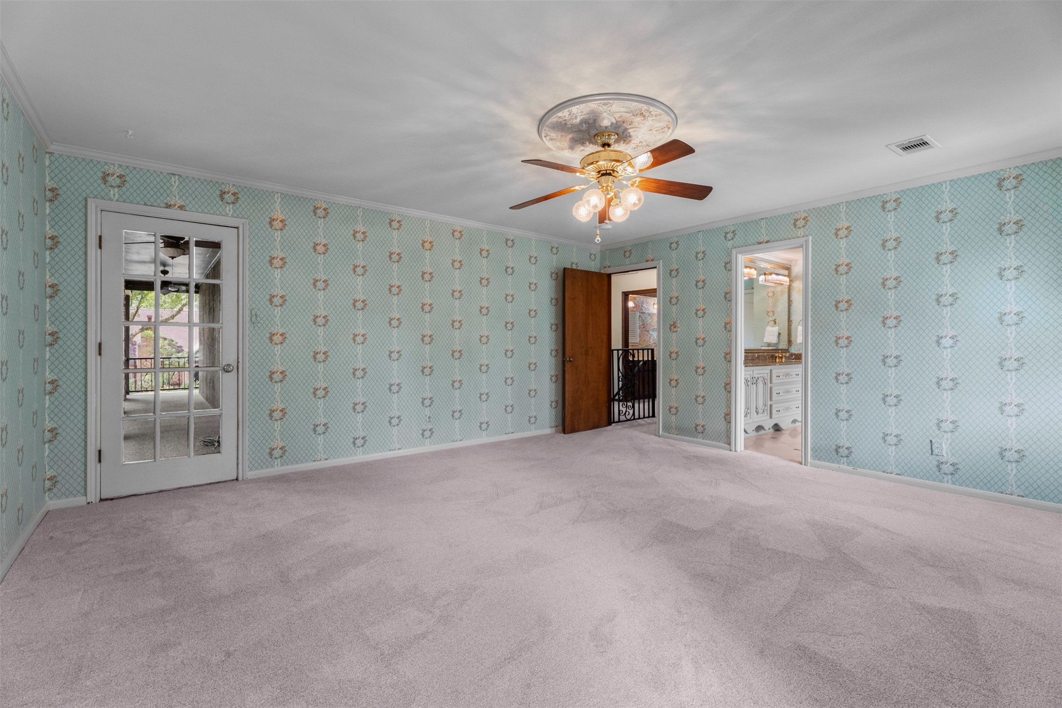 6106 Larkmount Drive Spring, TX 77389 - Photo 25 of 50 Another view of the primary bedroom. Notice the door to an amazing balcony.