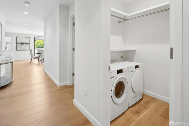 a utility room with dryer and washer