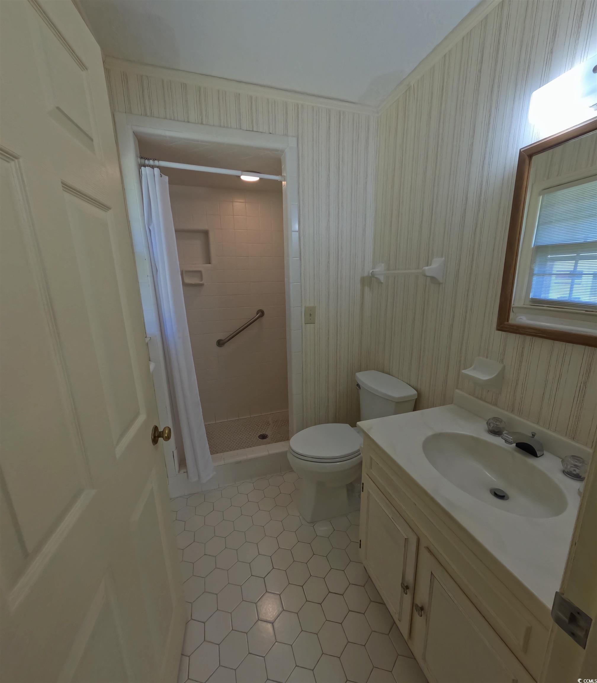 5580 Green Bay Circle Myrtle Beach, SC 29588 - Photo 14 of 36 Full bath featuring vanity, a shower stall, and light tile patterned flooring