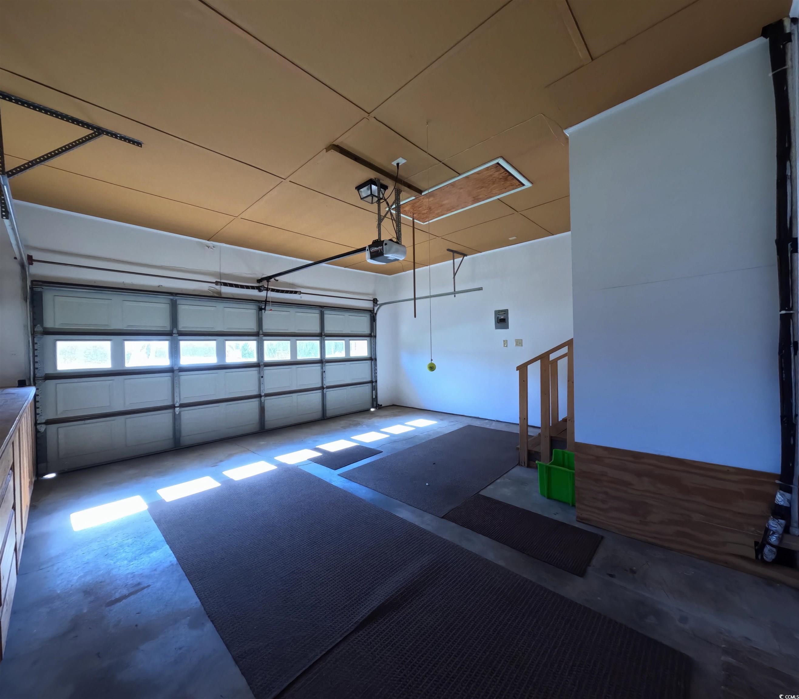 5580 Green Bay Circle Myrtle Beach, SC 29588 - Photo 29 of 36 Garage with a garage door opener