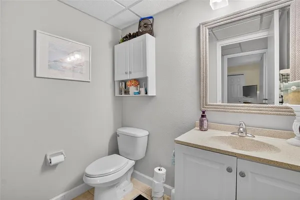 a bath room with a toilet and a bathtub
