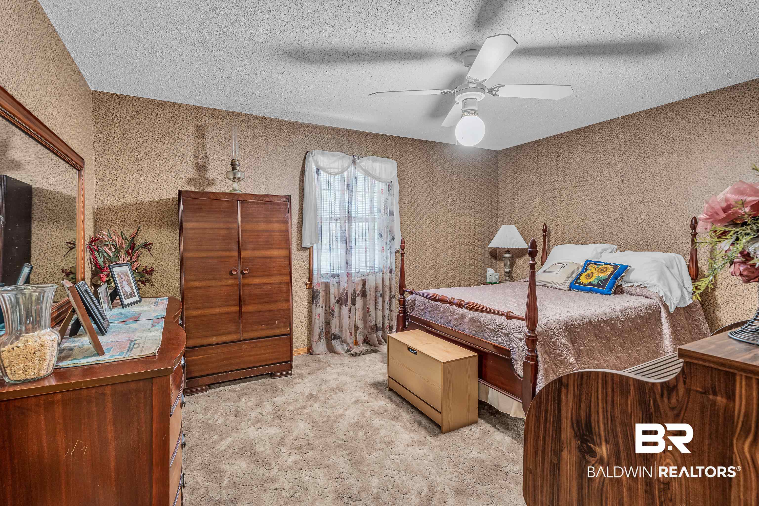72075 Highway 59 Little River, AL 36550 - Photo 24 of 40 Bedroom with a textured ceiling, light colored carpet, ceiling fan, and wallpapered walls