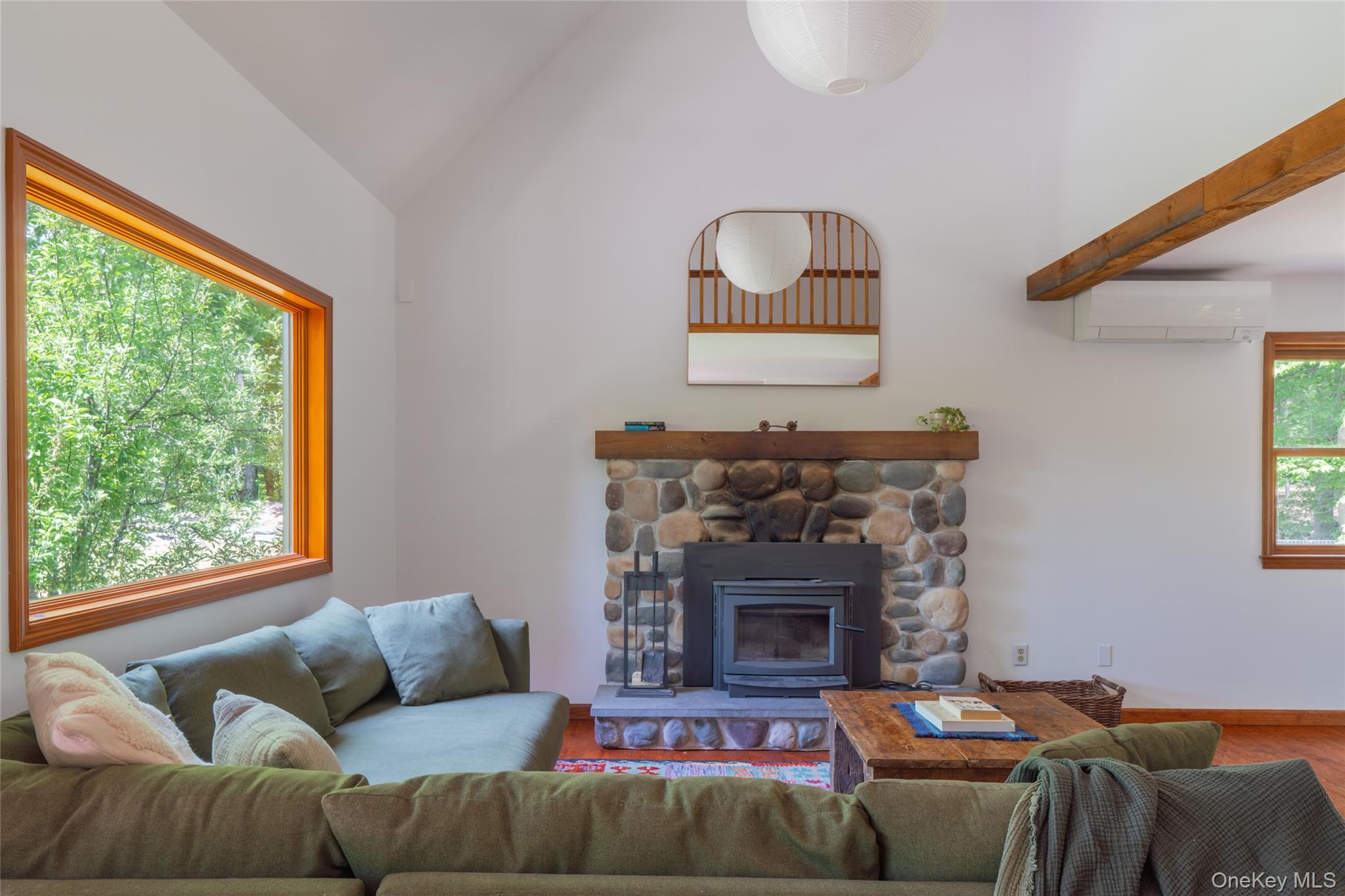 182 Frey Road Pine Bush, NY 12566 - Photo 3 of 33 a living room with furniture a window and a fireplace