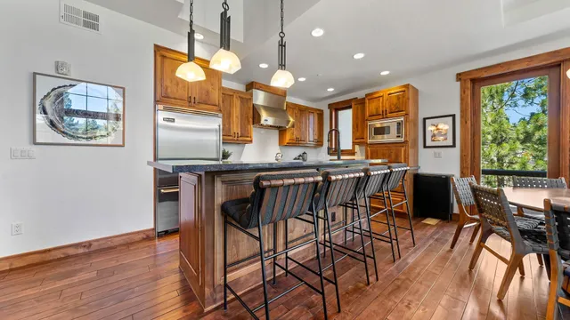 a living room with fireplace furniture and a flat screen tv