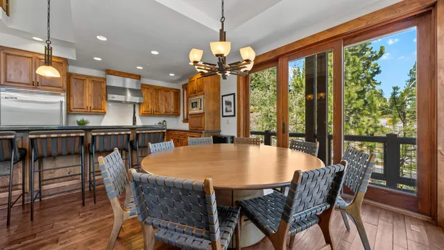 a kitchen with granite countertop stainless steel appliances and wooden cabinets