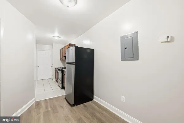 a kitchen with stainless steel appliances granite countertop a stove and a cabinets