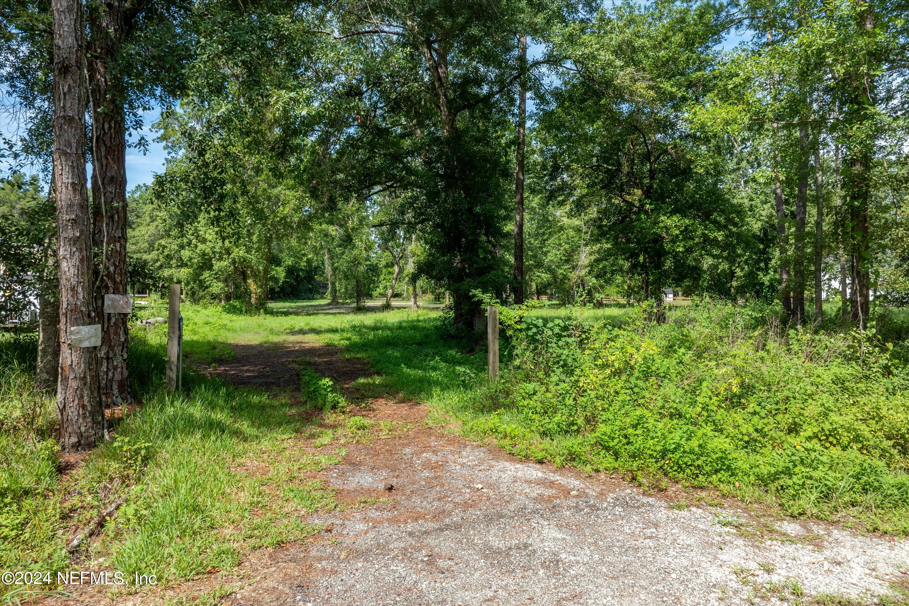 0 Sheffield Road St. Johns, FL 32259 - Photo 1 of 16 a view of a park with large trees