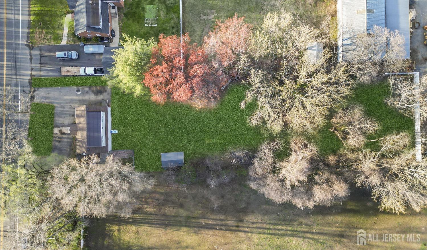 1550 Englishtown Road Old Bridge, NJ 08857 - Photo 16 of 20 a view of a lake with houses