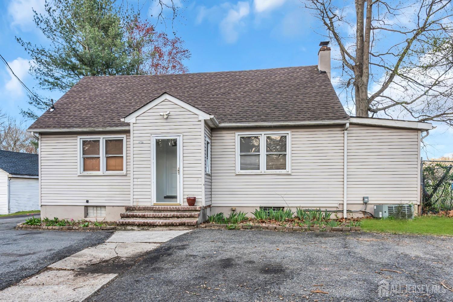 1550 Englishtown Road Old Bridge, NJ 08857 - Photo 20 of 20 a front view of a house with garden