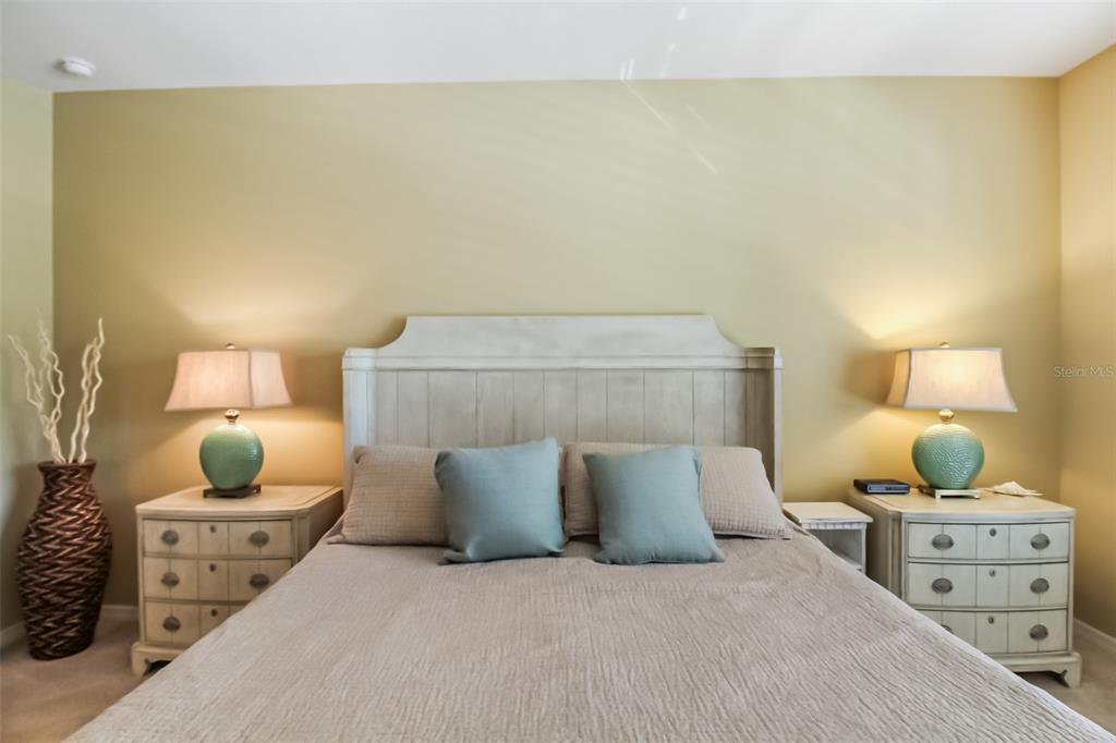 7333 Skybird Road Bradenton, FL 34209 - Photo 18 of 35 a bed room with a bed and a lamp