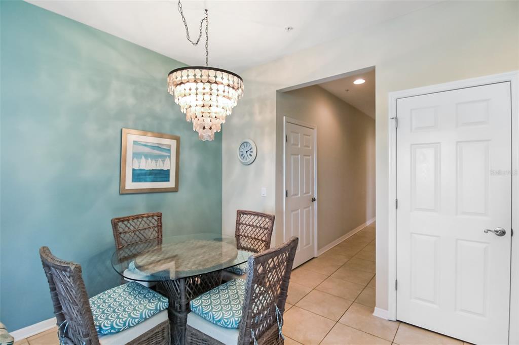 7333 Skybird Road Bradenton, FL 34209 - Photo 26 of 35 a view of a dining room with furniture and chandelier
