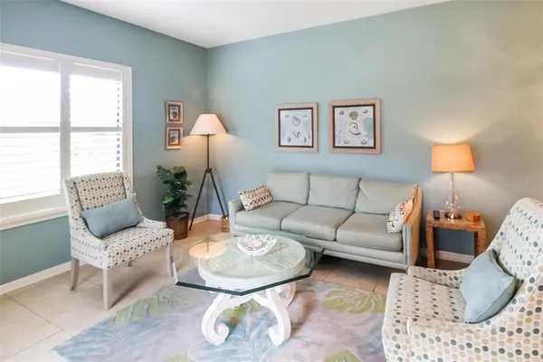 a living room with furniture and a couch