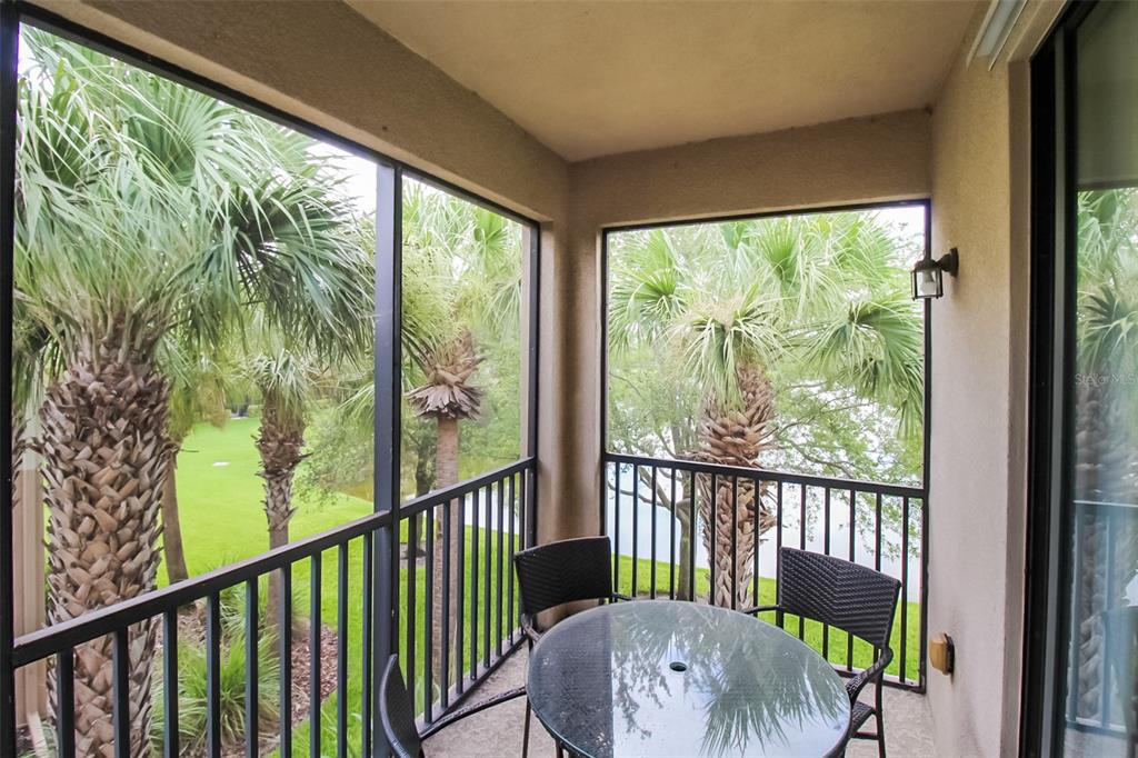 7333 Skybird Road Bradenton, FL 34209 - Photo 33 of 35 a view of a porch with furniture and garden