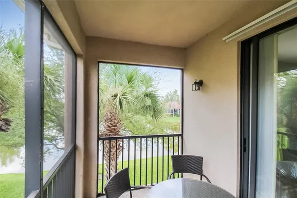 a view of a back yard from a balcony