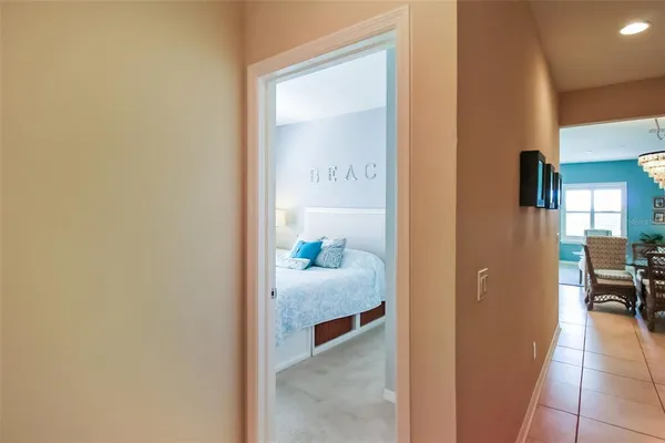 a en suite bathroom with a granite countertop sink and a mirror